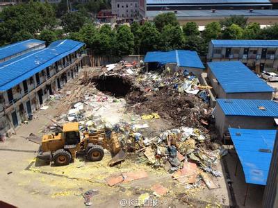 在建楼盘塌陷两工人失踪3个月 遗体工地内被挖出