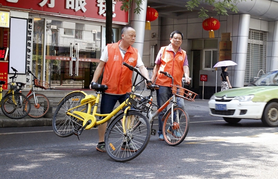 武汉首创三大共享单车同聘单车管家破解停放乱象