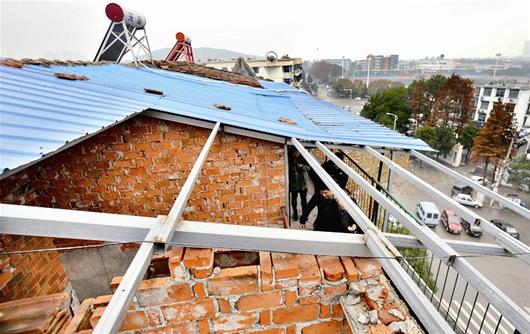 吳家山一業主頂樓自建房屋出租城管多次上門拆不掉